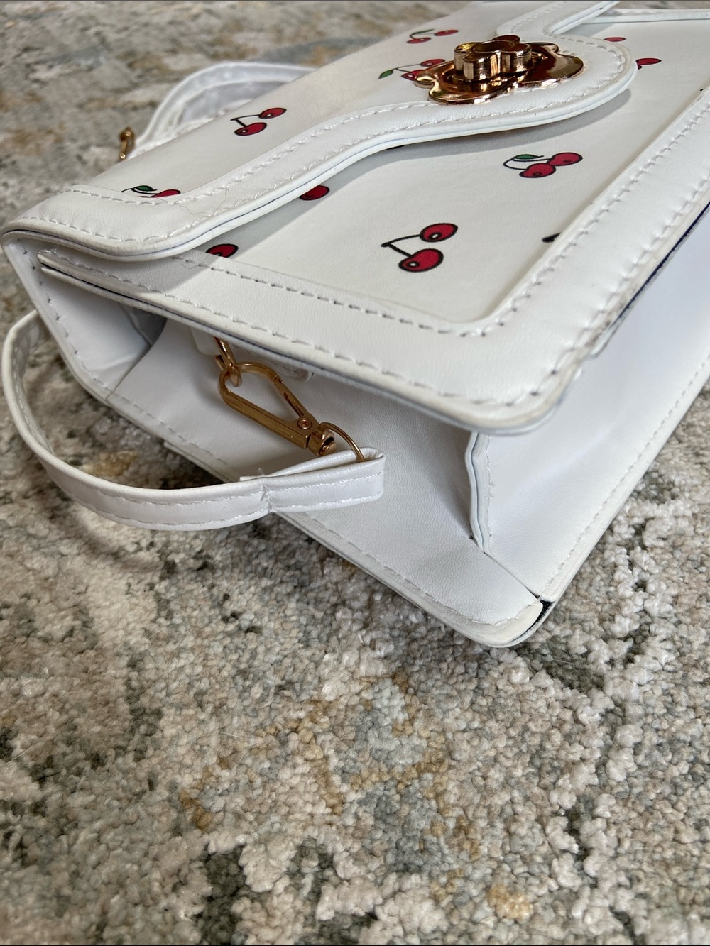 White Cherry Print Mini Crossbody Bag with Top Handle and Turn Lock Hardware - Picture 12 of 12